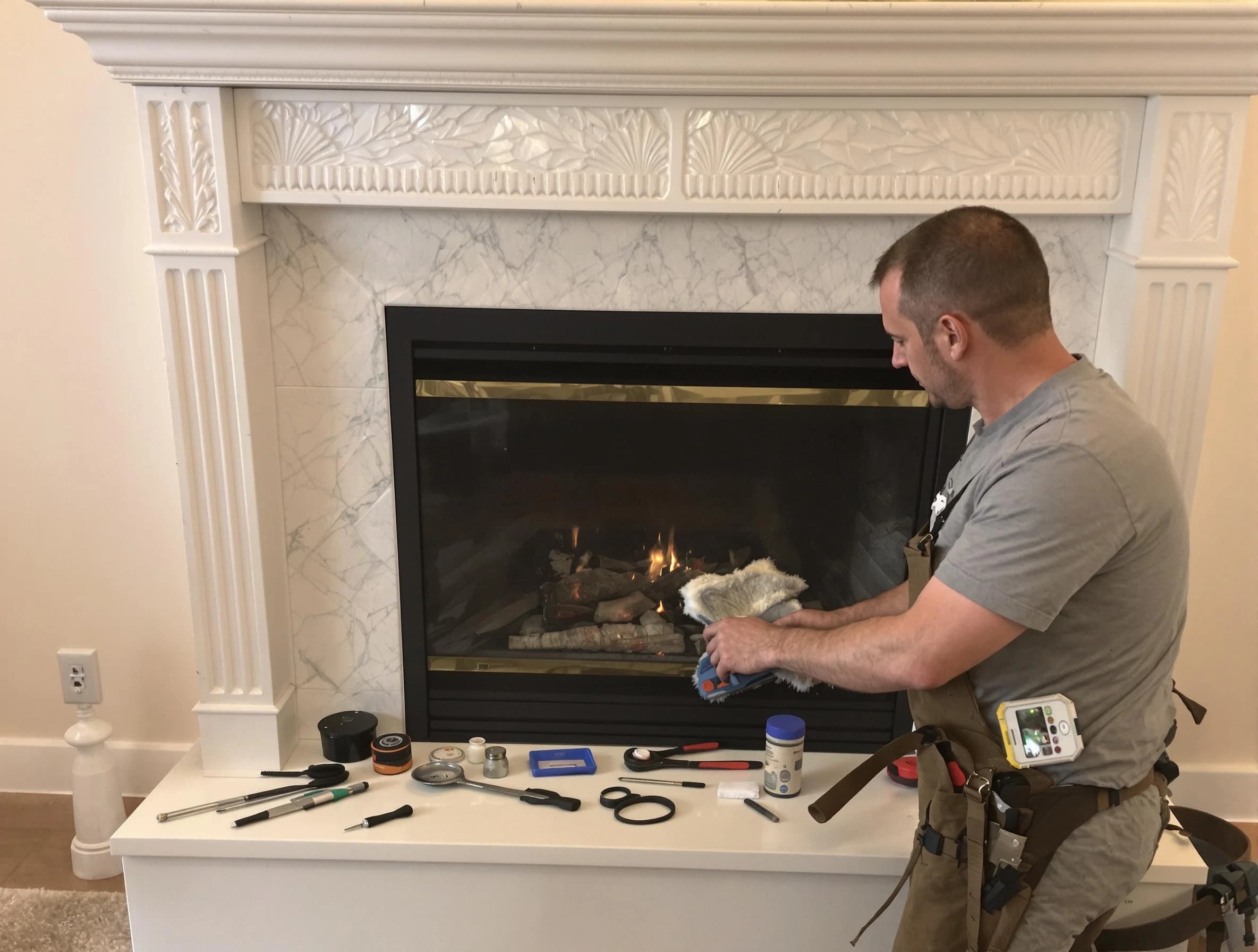 Homeacre-Lyndora Chimney Sweep performing fireplace maintenance in Homeacre-Lyndora, PA